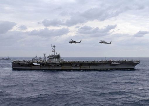資料圖：美軍“喬治·華盛頓”號(hào)航空母艦與反潛機(jī)編隊(duì)。