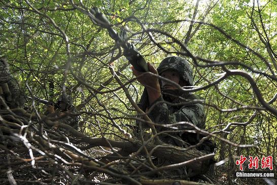 解放軍老虎連演練登島沖鋒 24次奪世界賽事冠軍