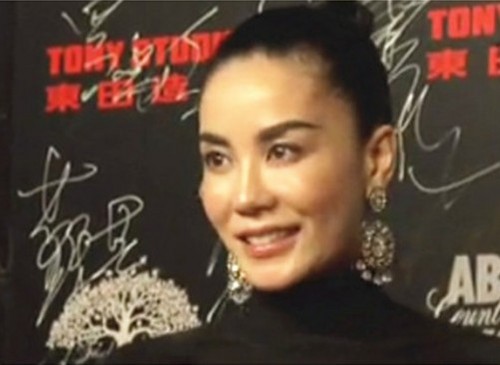 王菲頭挽發(fā)髻女王范十足