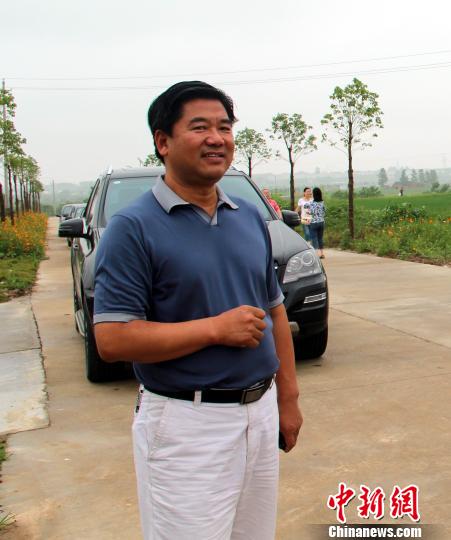 張德華在工作中。2012年資料圖 吳奇勇 攝
