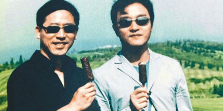 張國(guó)榮和唐唐舊照。